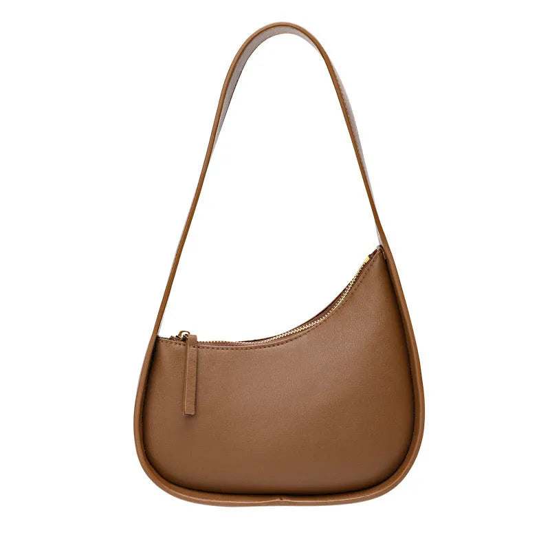 Genuine leather half moon ladies shoulder bag with wide strap and zipper closure in small size
