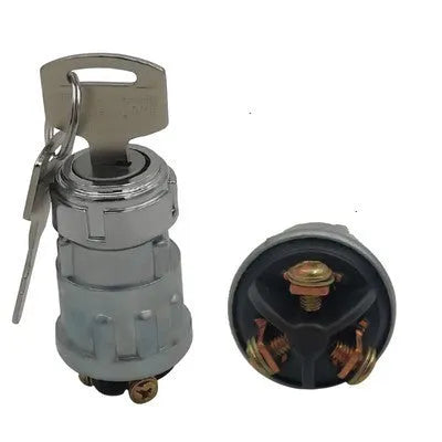 Copper ignition switch and key for trucks and forklifts on a white background.