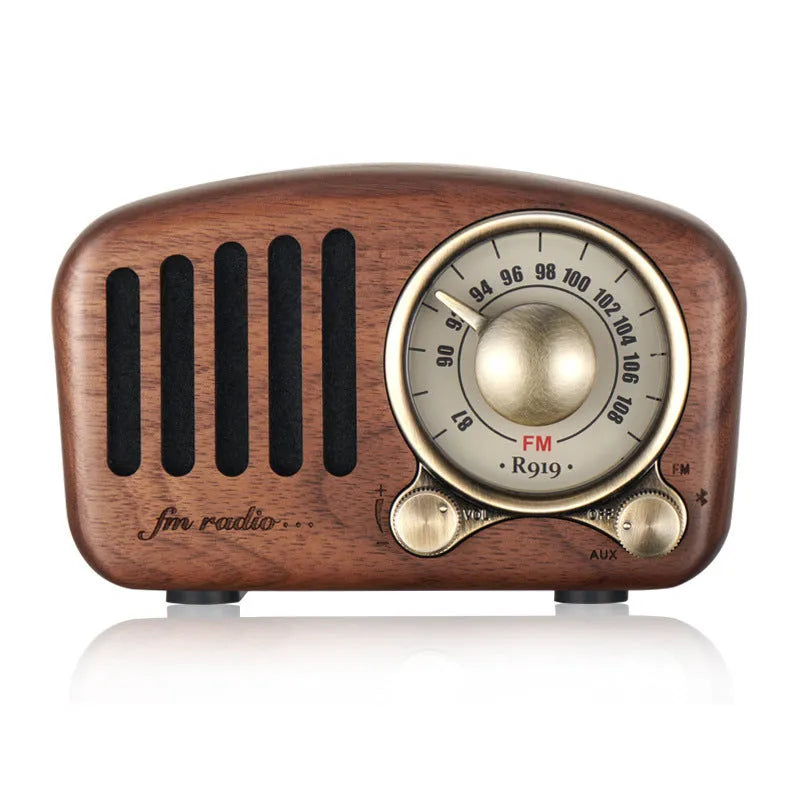 Retro wooden Bluetooth speaker in natural wood finish with compact dimensions