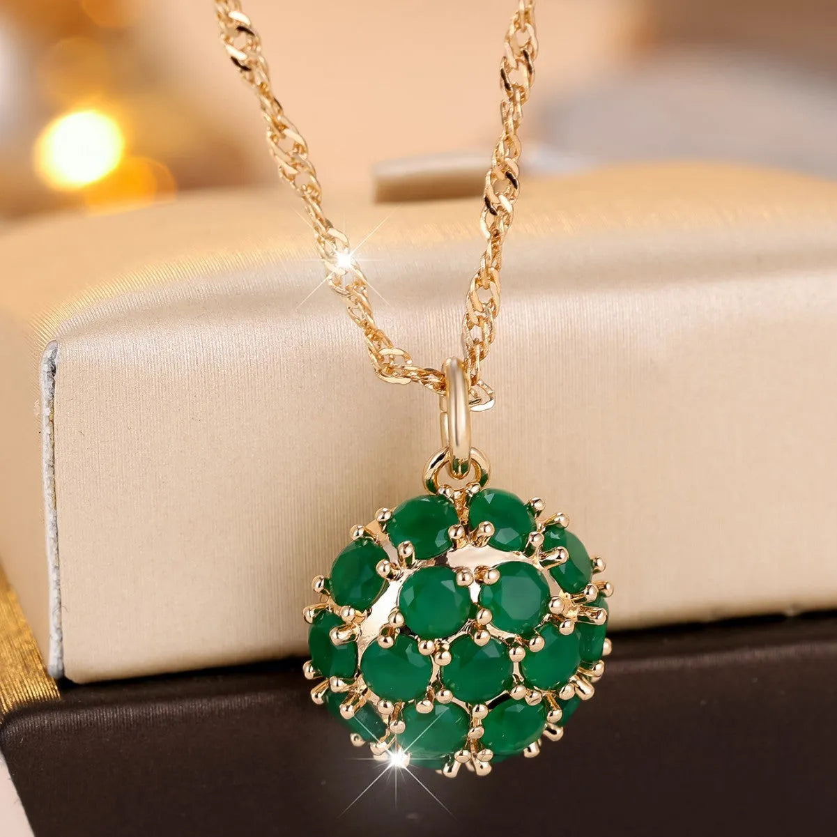 Round geometric emerald diamond necklace with adjustable chain in champagne gold electroplated finish