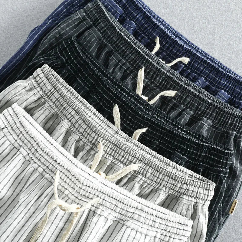 Men's striped cotton casual shorts in light blue with straight leg and mid waist design