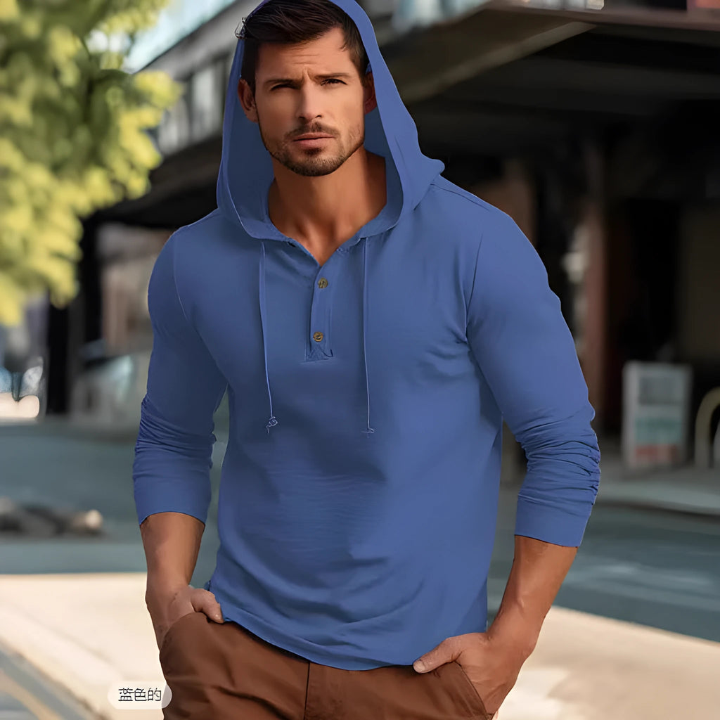 Men's dark blue cotton pullover hoodie with a hood and long sleeves on a hanger.