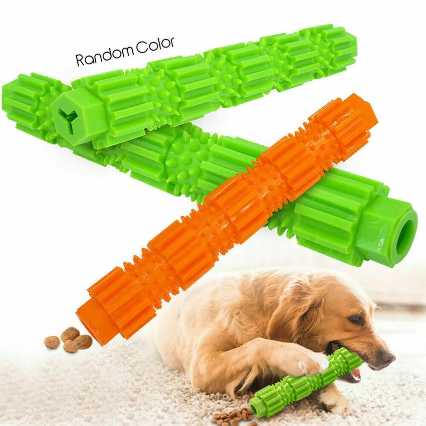 Green and orange rubber dog chew toy with hollow centre for treat dispensing