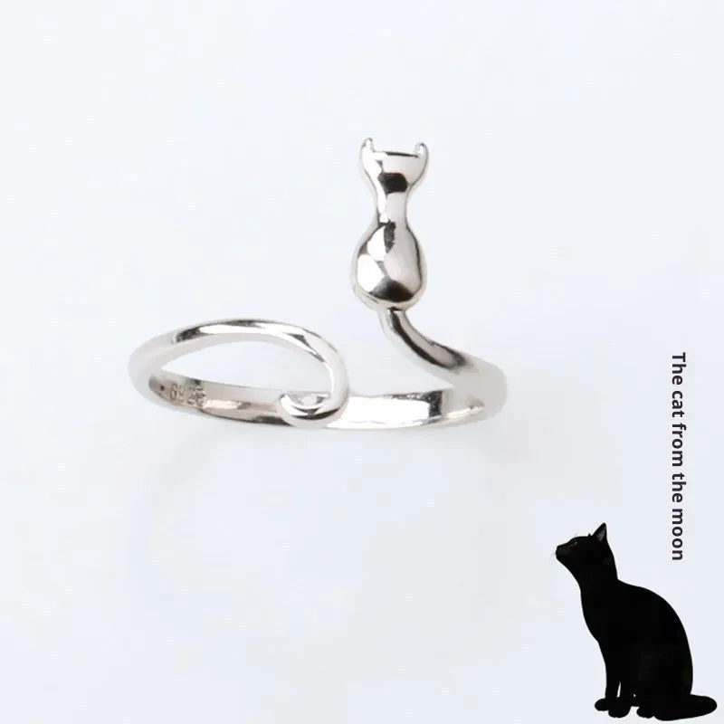 Platinum colour alloy cat face open ring with adjustable opening on white background