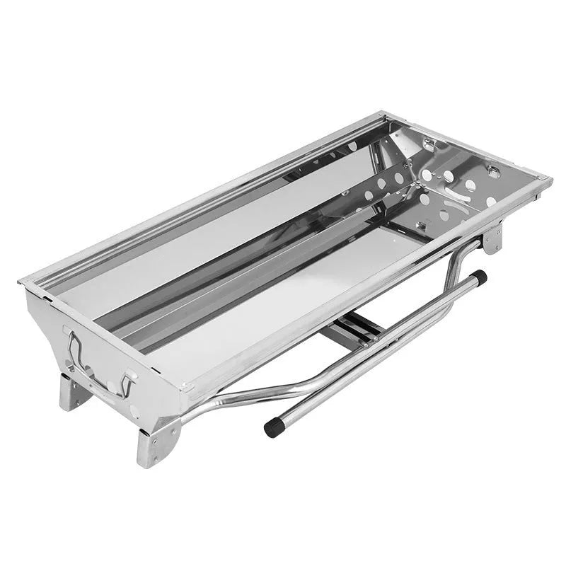 Large stainless steel flip-over barbecue oven with iron grills and charcoal trays for outdoor cooking
