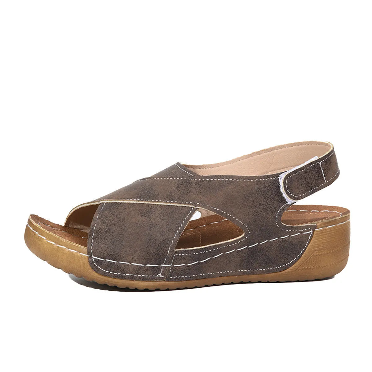 Roman platform sandals with decorative skirt and velcro closure in earth-tone colour