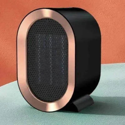 Black desktop electric fan heater with mechanical dial controls and ceramic heating technology