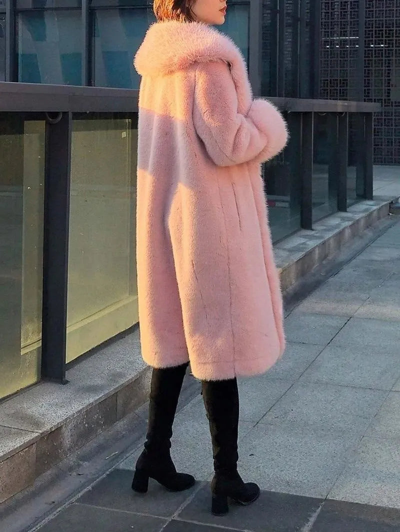 Grey women's mid-length coat with faux fur body, leather detailing, and a matching artificial fur collar.