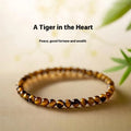 New Chinese style Tigereye bracelet with spherical beads in geometric design.