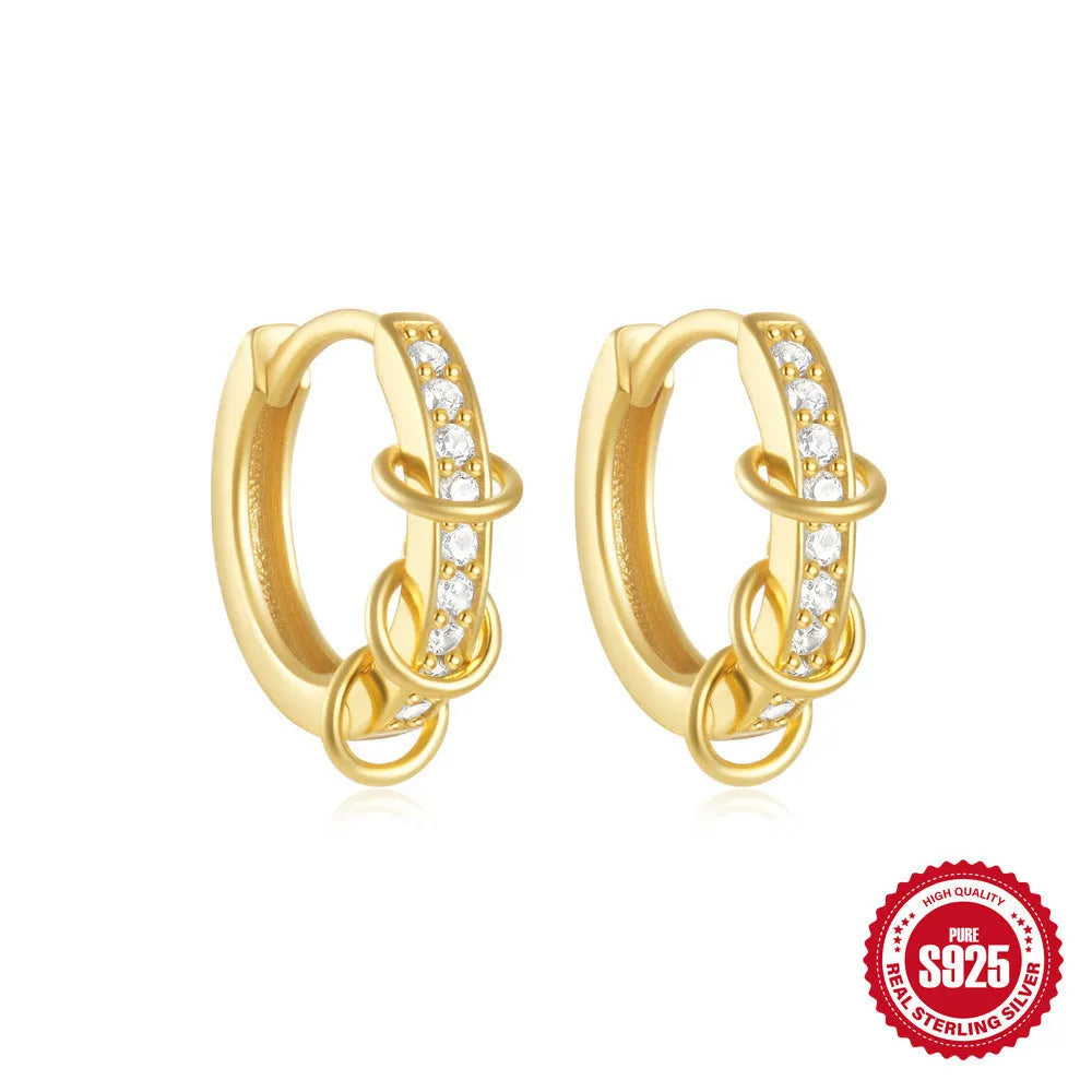 Sterling silver geometric stud earrings with small round design elements in gold or silver finish