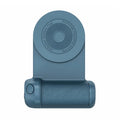 Black magnetic phone camera grip with rotatable bracket and ergonomic PU leather handle on a table.