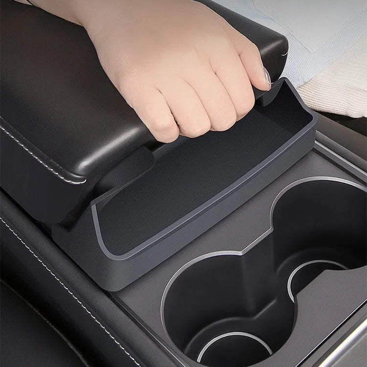 Black silicone glasses case mounted on Tesla Model 3 centre console