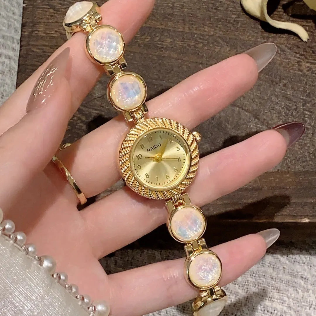 Women's quartz watch with 25mm round dial in choice of six colours on wrist.