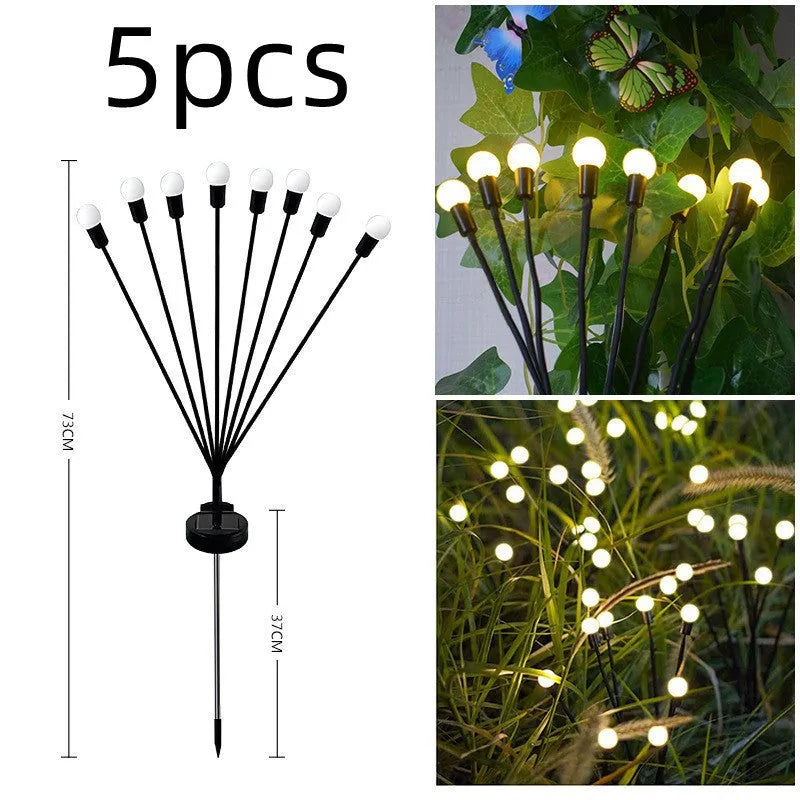 Solar-powered LED ground spike garden light with multiple heads and stainless steel soil plug.