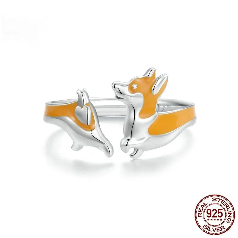 Silver electroplated fashion ring with a cute cartoon corgi dog design on it.
