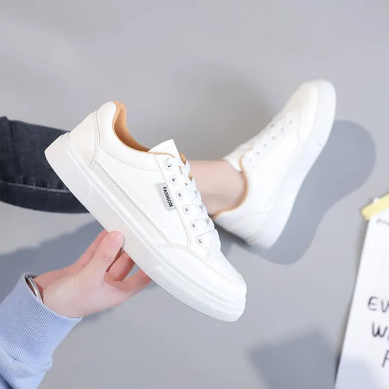 Korean style low-top women's sneakers in white or brown with artificial PU upper and plastic sole