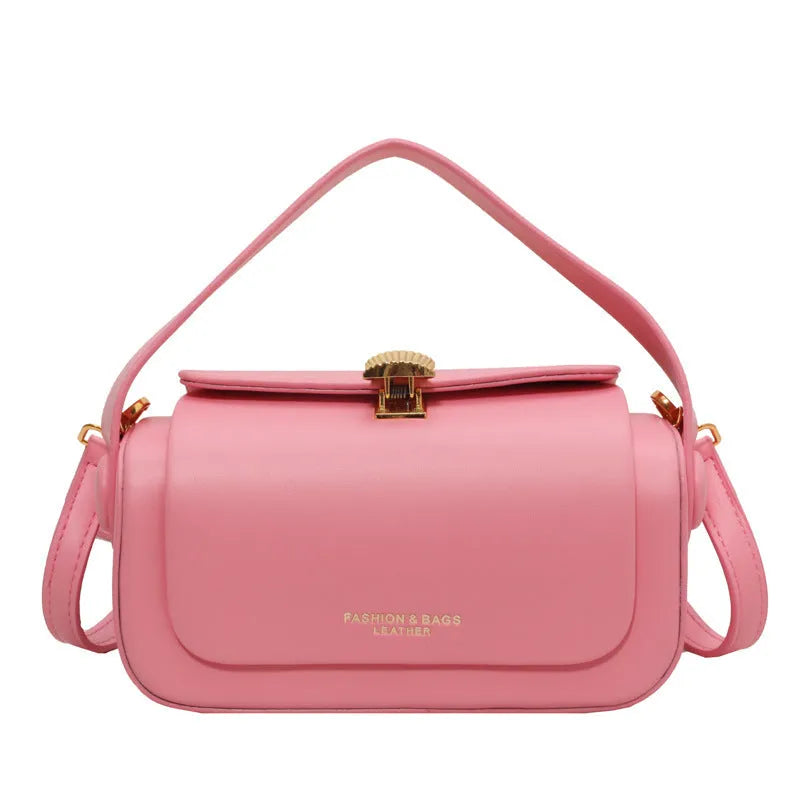 Women's personalised PU messenger bag with letter detailing in beige, shown from the front.