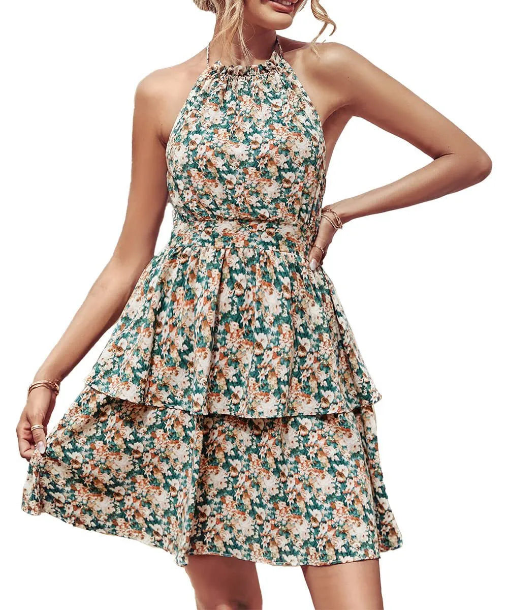 Women's boho-style backless halter dress with ruffled A-line skirt in a printed pattern.