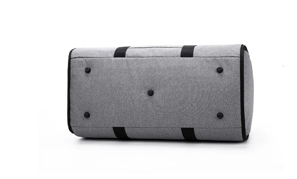 Cylinder-shaped travel bag in red, light grey, blue, or black colour with a zipper opening.