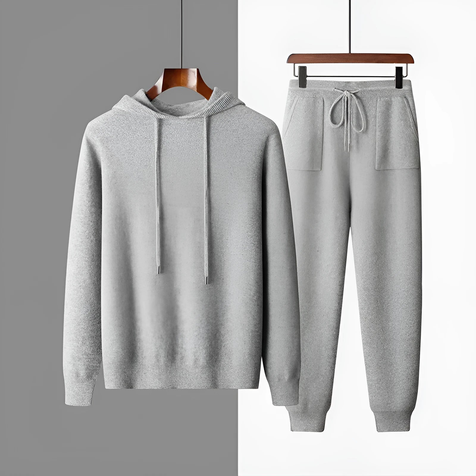 Men's light grey cashmere hooded sweatshirt and matching trousers leisure set on hanger