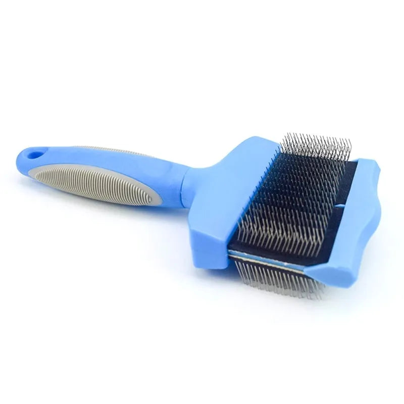 Double-sided pet brush showing stainless steel pins on one side and soft bristles on the other, with blue handle.