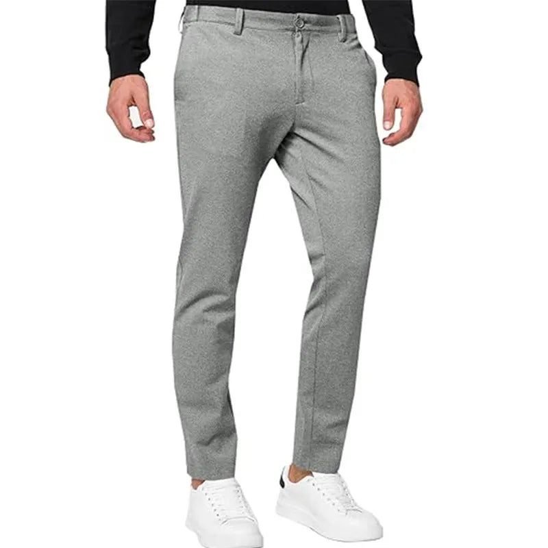 Men's slim-fit tapered chino trousers in stretch cotton blend fabric with pleated front detail