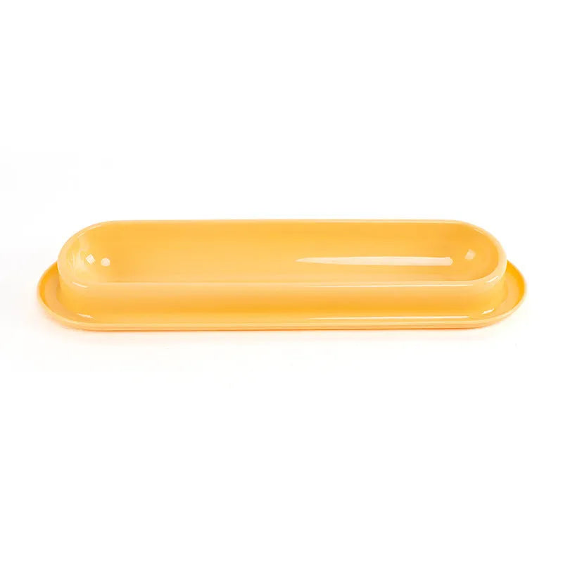 Green leakproof pet bowl with stainless steel insert and silicone base for dogs and cats.
