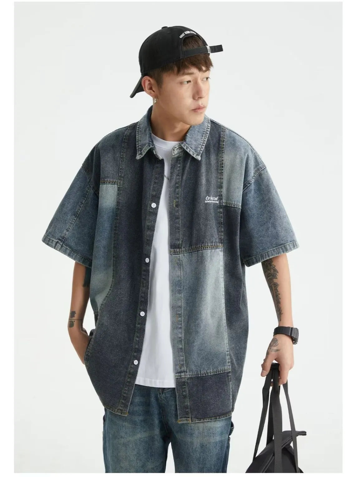 Blue men's denim shirt with washed stitching details and loose cardigan fit