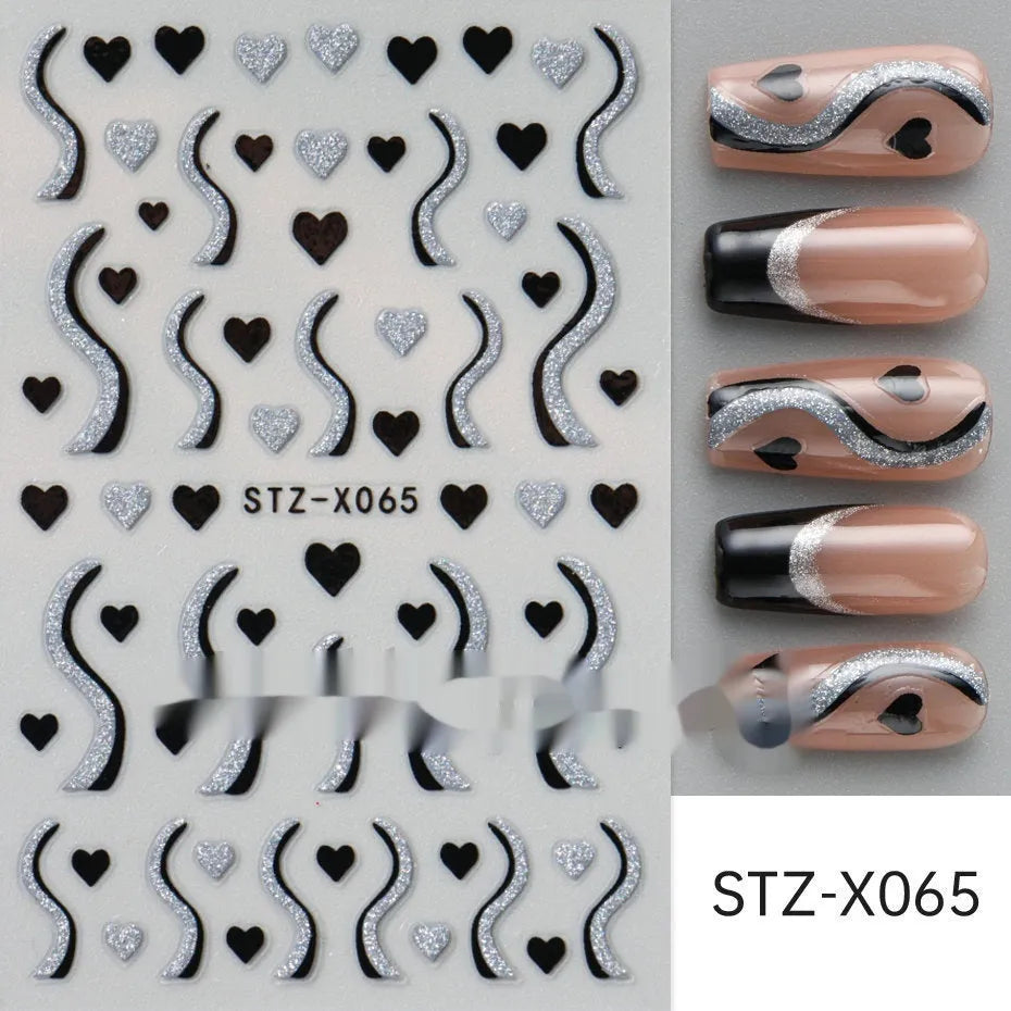Sheet of black and silver love heart pattern nail art stickers with a plastic nail patch.
