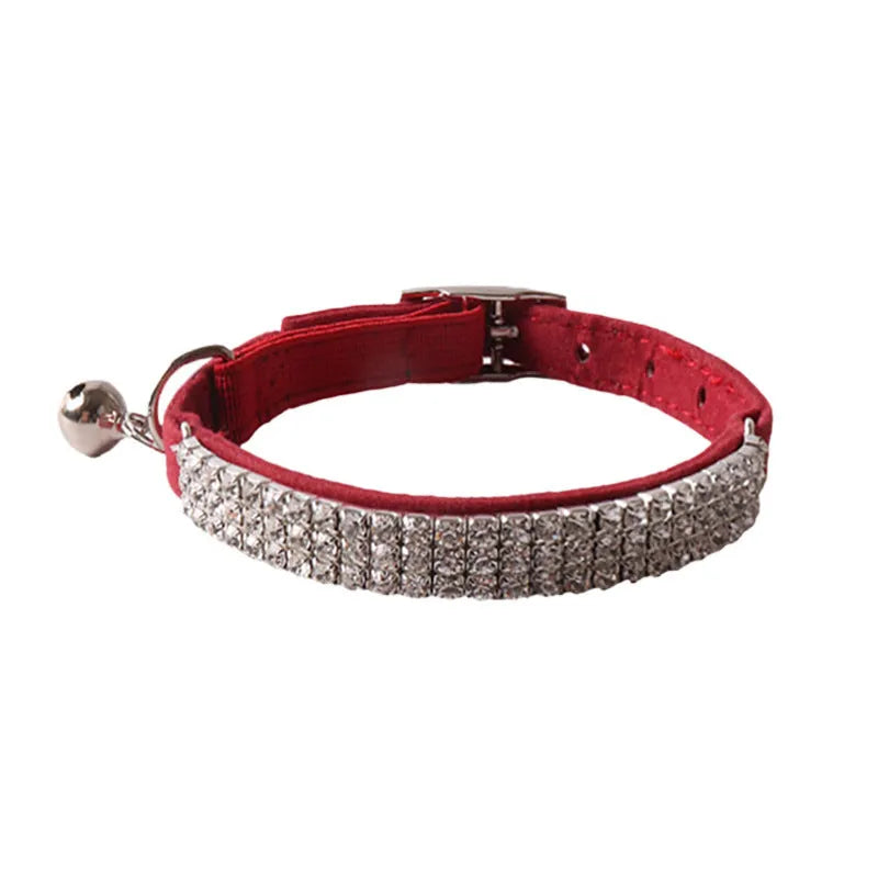 Colourful flocked cat collar with elastic buckle in pink, black, red, blue, purple, and dark brown options.
