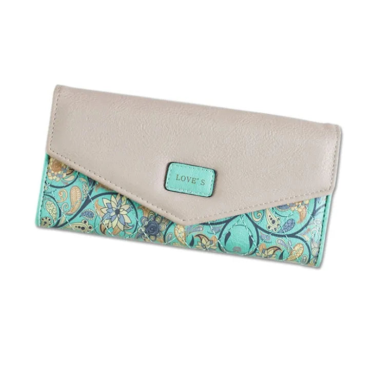Open trifold women's wallet showing card slots and buckle closure in one of five colours.