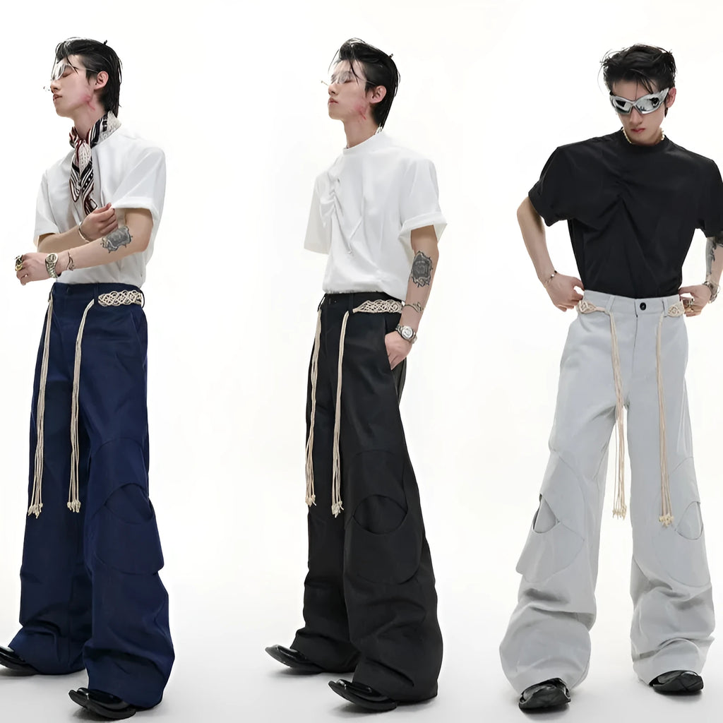Men's dark blue cotton straight-leg jeans with loose fit, showing 3D cutting and belt stitching detail.