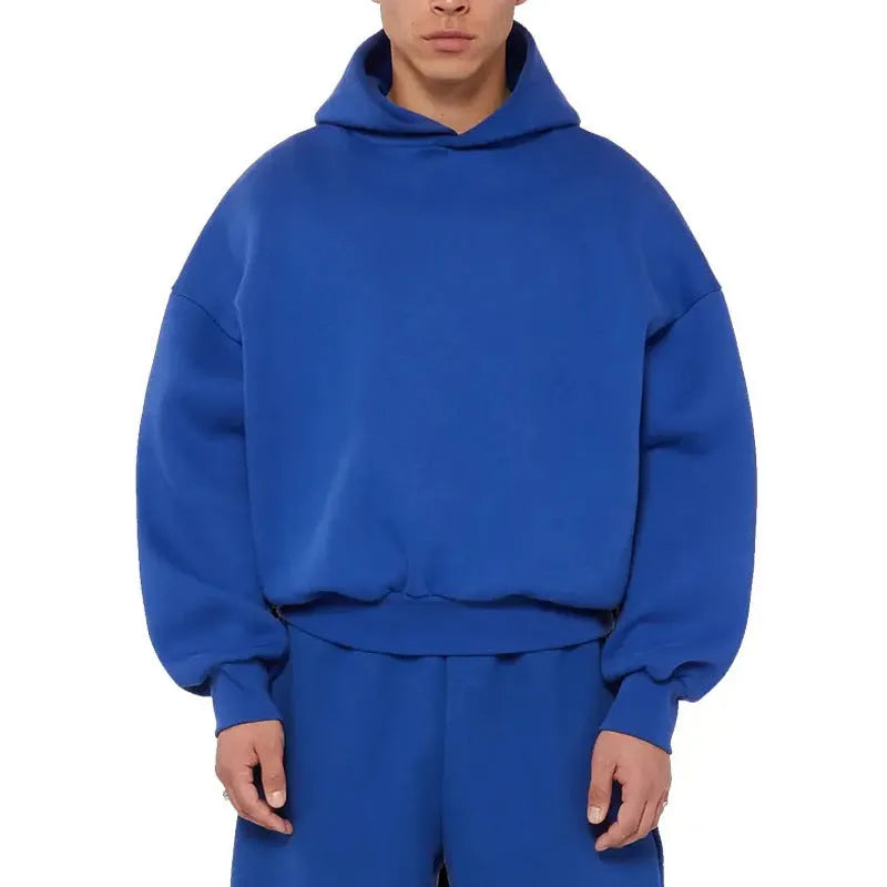 Men's grey fleece-lined cotton pullover hoodie with a front pocket and threaded long sleeves.
