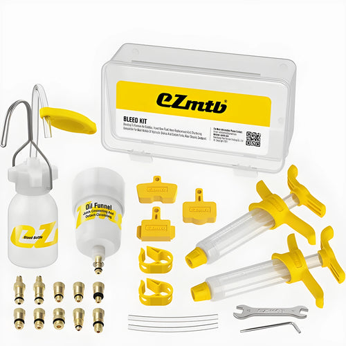 EZmtb bicycle hydraulic brake bleed kit showing syringes, funnels, adapters, and wrenches on a table
