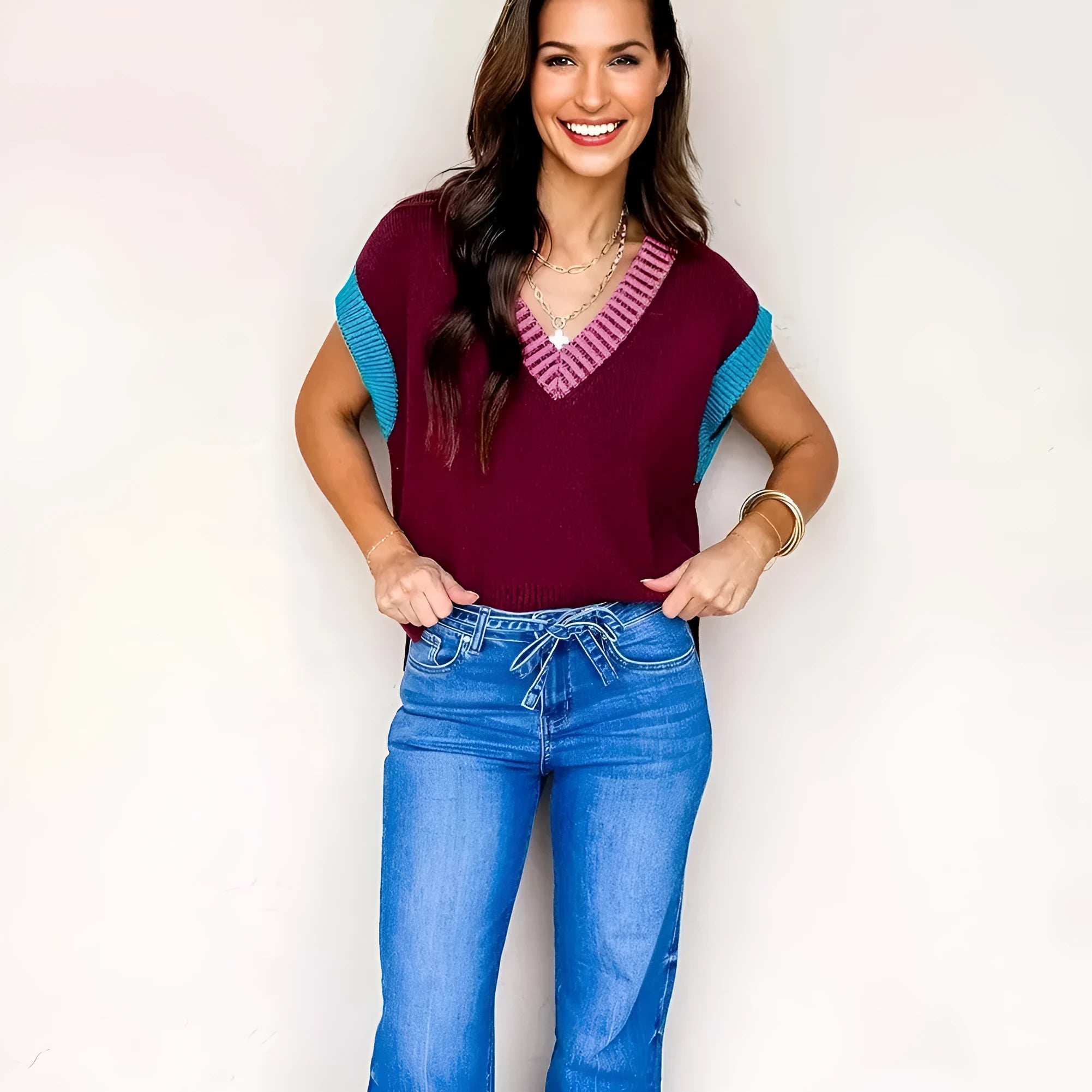 Burgundy women's loose sweater with V-neck contrast trim and cuffed short sleeves