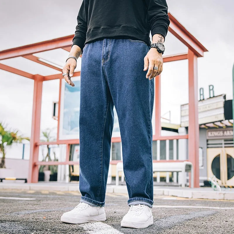 Men's loose straight casual jeans in dark blue, light blue and grey colours with mid waist design