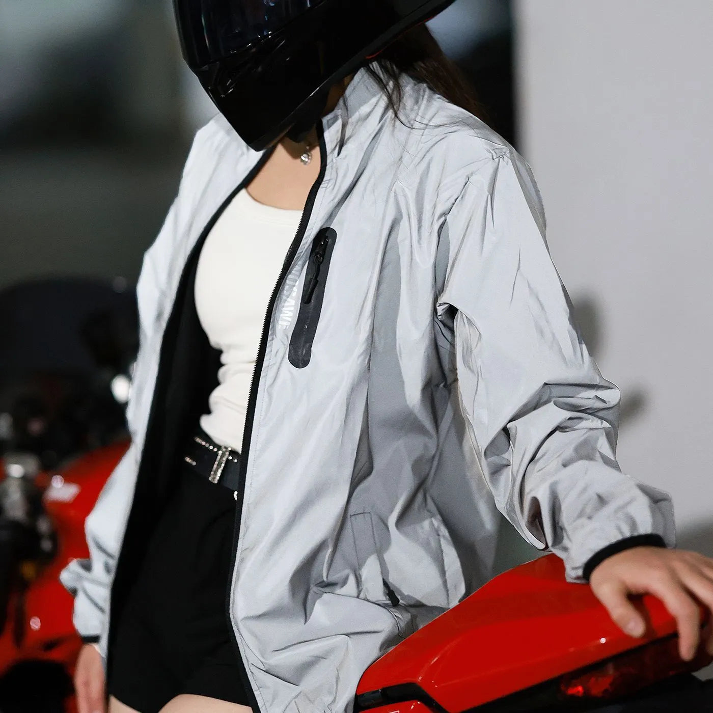 Silver waterproof polyester long sleeved top with windproof function on mannequin