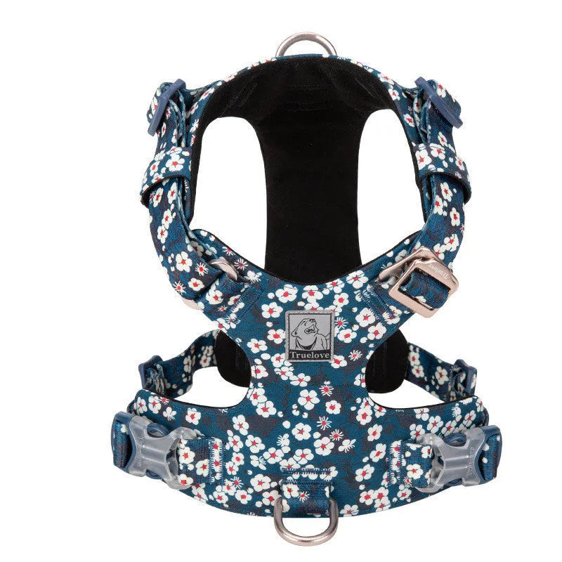 Floral pattern pure cotton dog harness vest shown in blue, green, and red colours on a size chart from XXS to XL.