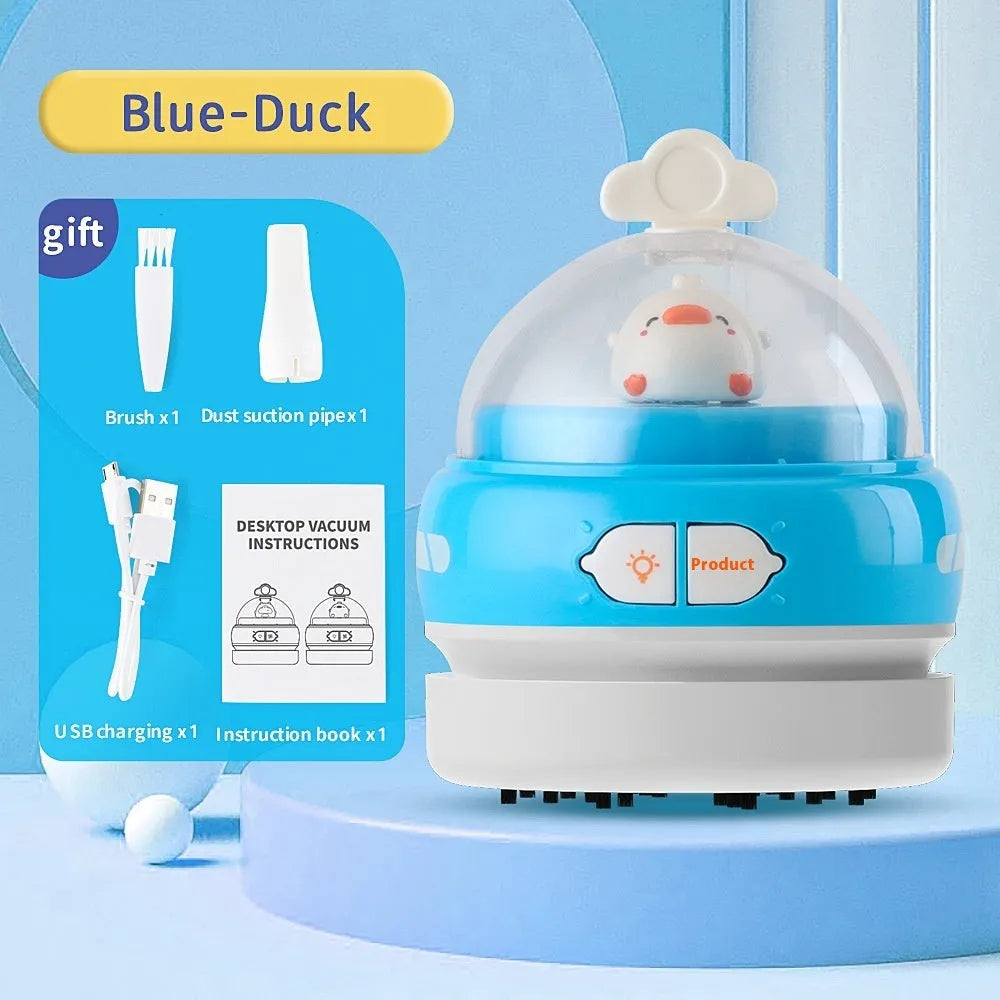 USB handheld desktop vacuum cleaner in blue rocket design on a wooden desk