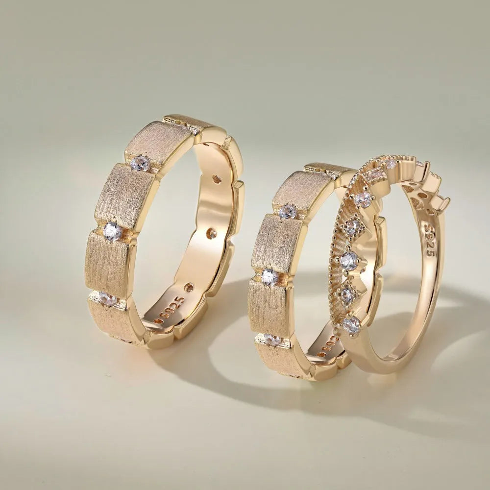 S925 sterling silver slim ring with round zirconium inlay and geometric cutout pattern on a white background