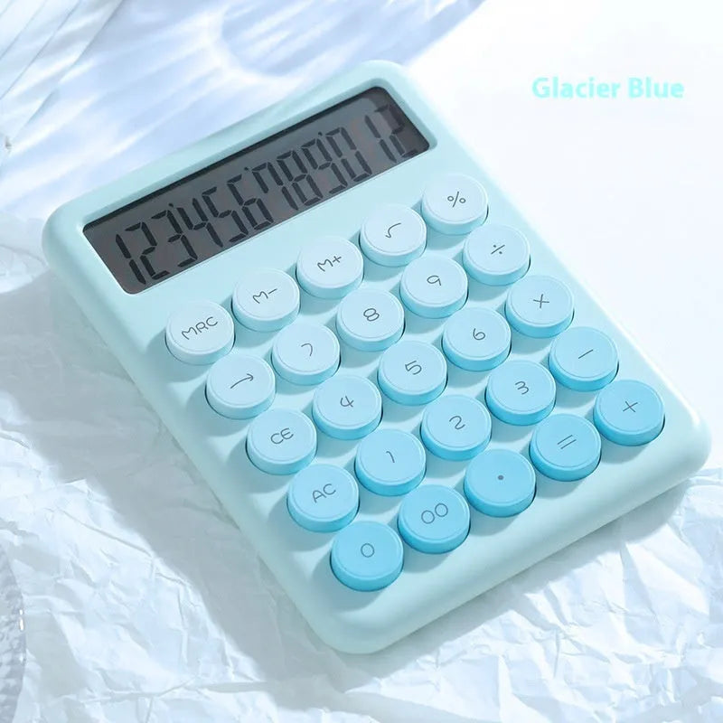 Dopamine gradient colour desk calculator in violet, pink, blue, and green options on a desk