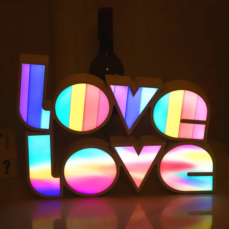 Rainbow coloured LED decorative light spelling LOVE, with USB cable.