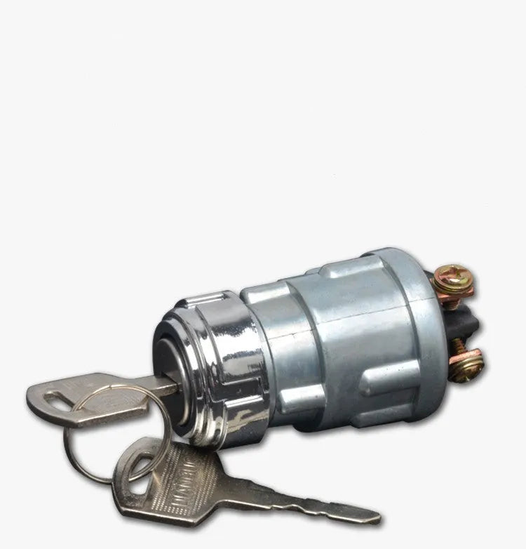 Copper ignition switch and key for trucks and forklifts on a white background.