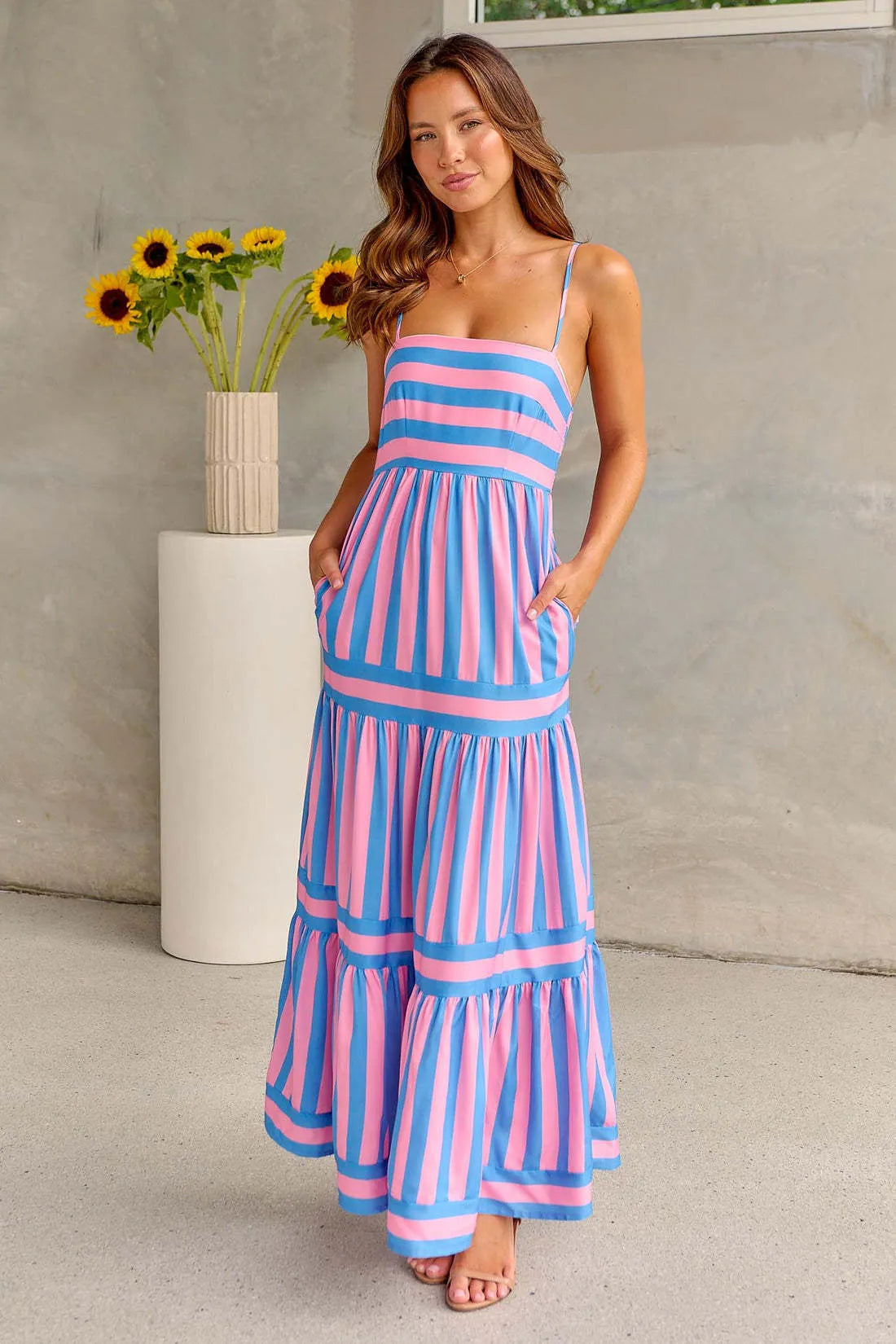 Women's striped backless summer dress with suspender straps and side pockets in polyester spandex fabric