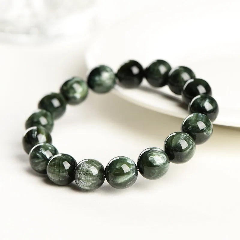 Green Dragon Crystal bracelet with 8-9mm round beads featuring Ruyi geometric design