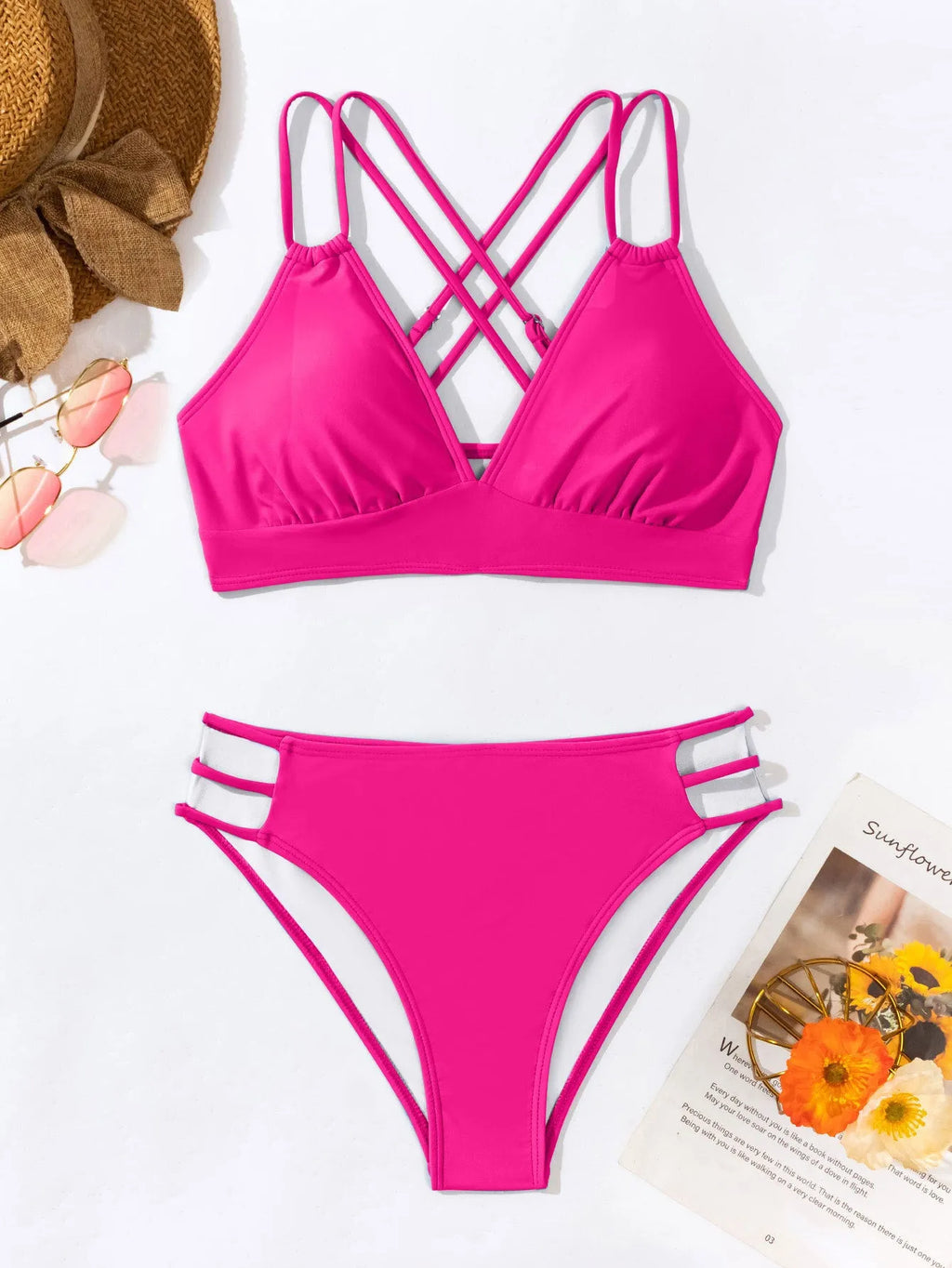 Women's black V-neck halter bikini with split-style shorts on a mannequin.