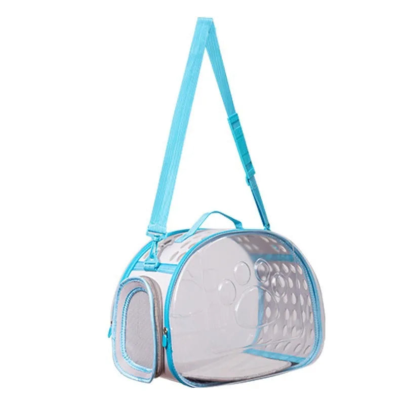 Transparent space capsule style backpack carrier for a cat, shown in lake blue colour, with hard EVA construction.