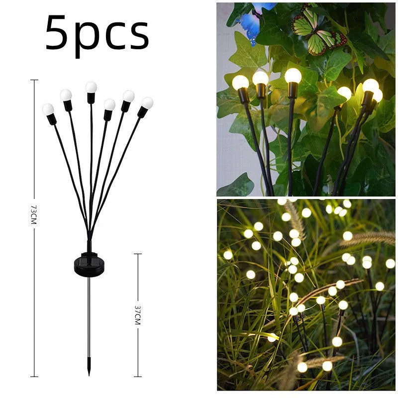 Solar-powered LED ground spike garden light with multiple heads and stainless steel soil plug.