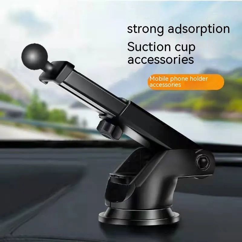 Silver car mobile phone holder with wireless charging dock mounted on a car air vent.