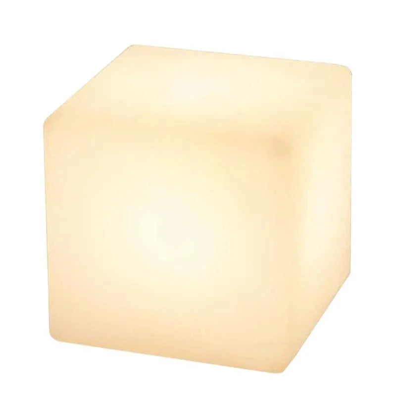 White square LED cube stool light for outdoor use, showing modern design with solar panel or charging port.